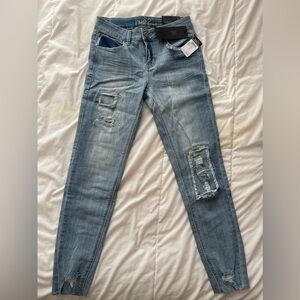Distressed Light Blue Jeans for Women